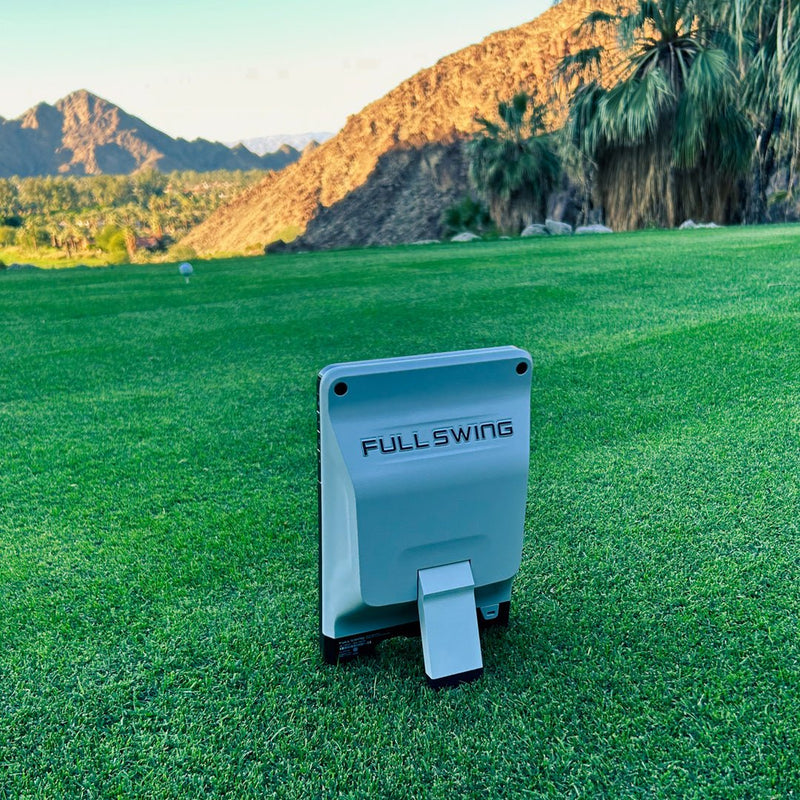 Full Swing KIT launch monitor rear view showing connectivity ports and mounting