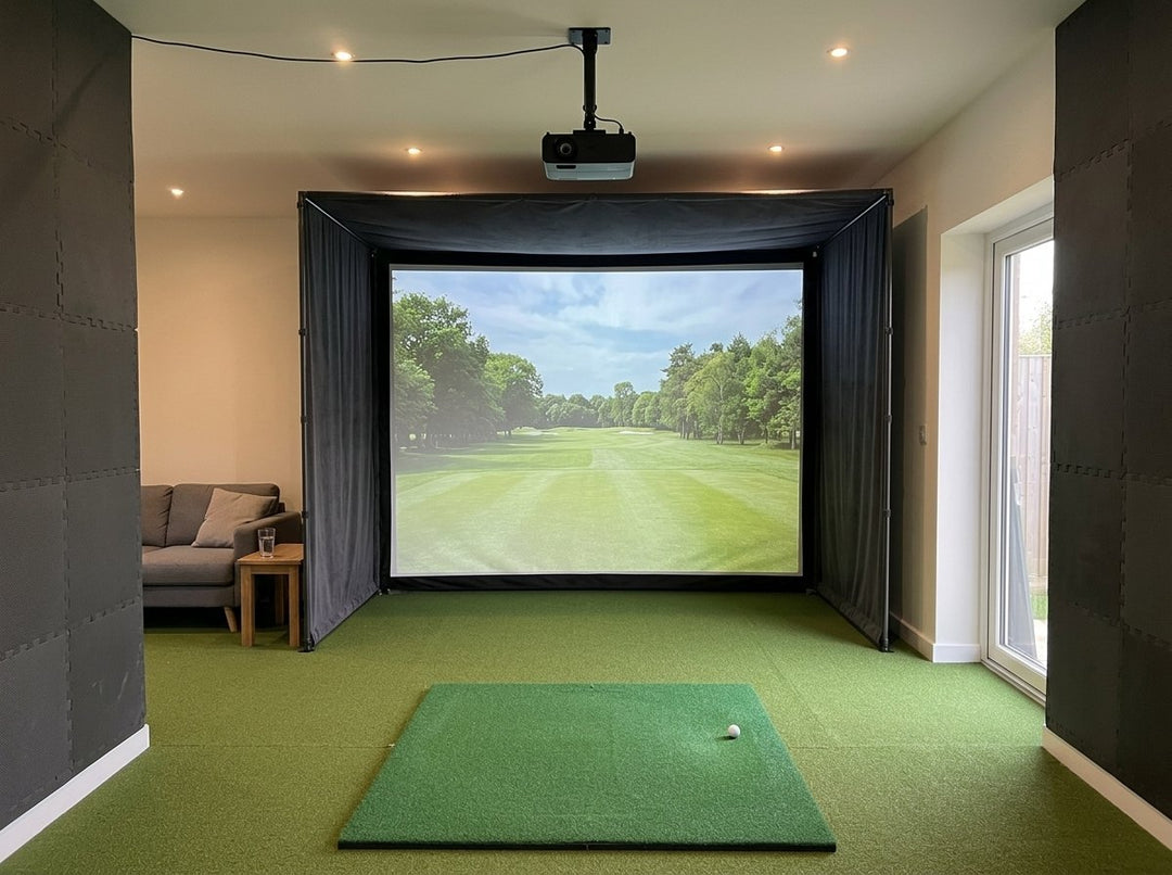 Illustration: golf simulator enclosure, hitting mat and a ceiling-mounted projector in a UK garden room with padded wall panels, daylight