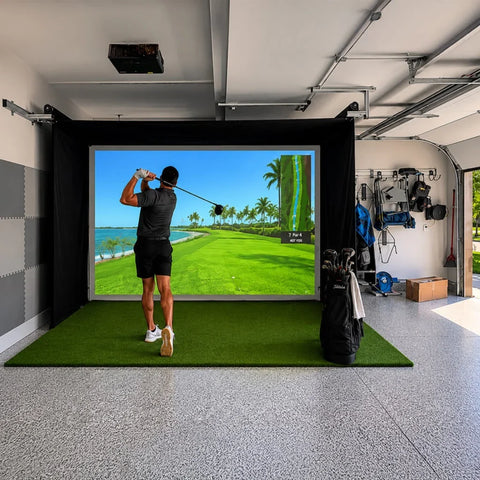 SportScreen Vanish 13H in a garage, screen down, golfer swinging