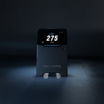 Full Swing KIT launch monitor in use during a golf swing at home