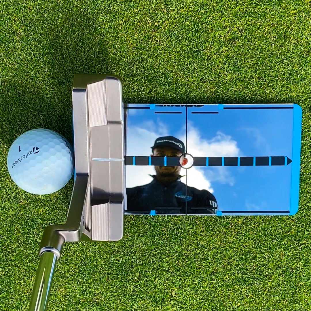 Short game alignment mirror with golf practice net and mat setup