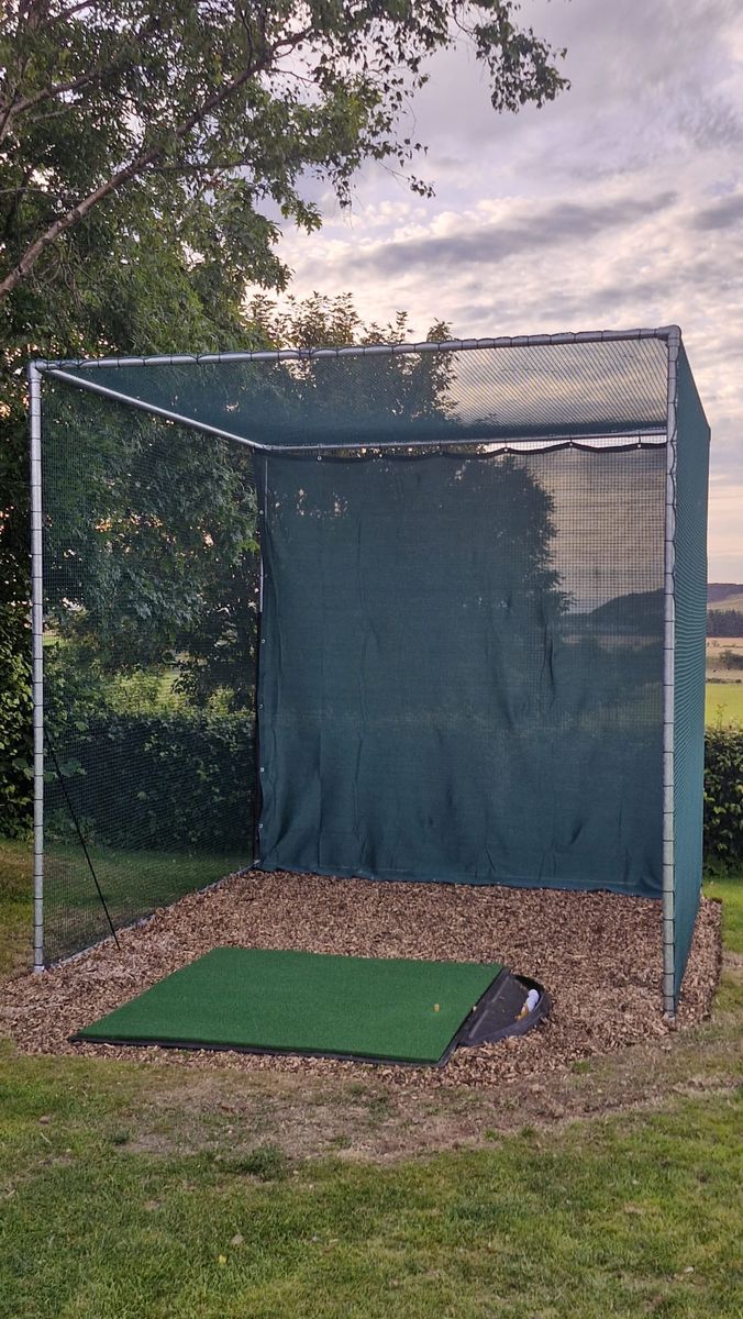 A real OpenGolfer customer golf cage in a UK garden