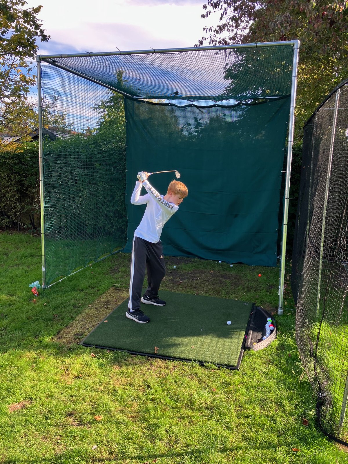 A real OpenGolfer customer golf cage in a UK garden